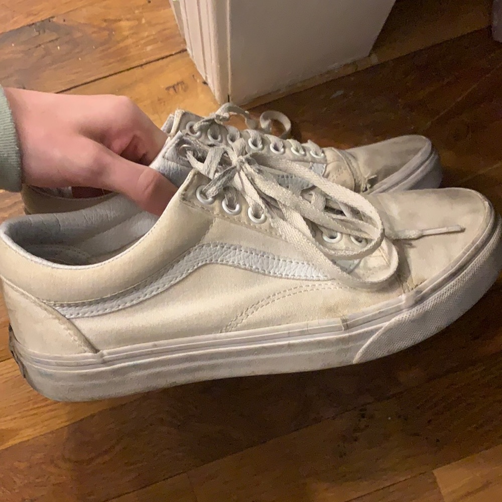 Distressed white laced Vans